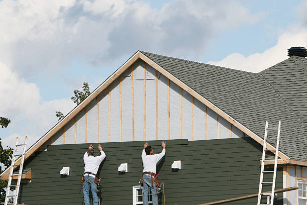 Professional Siding technician working in Northford, CT